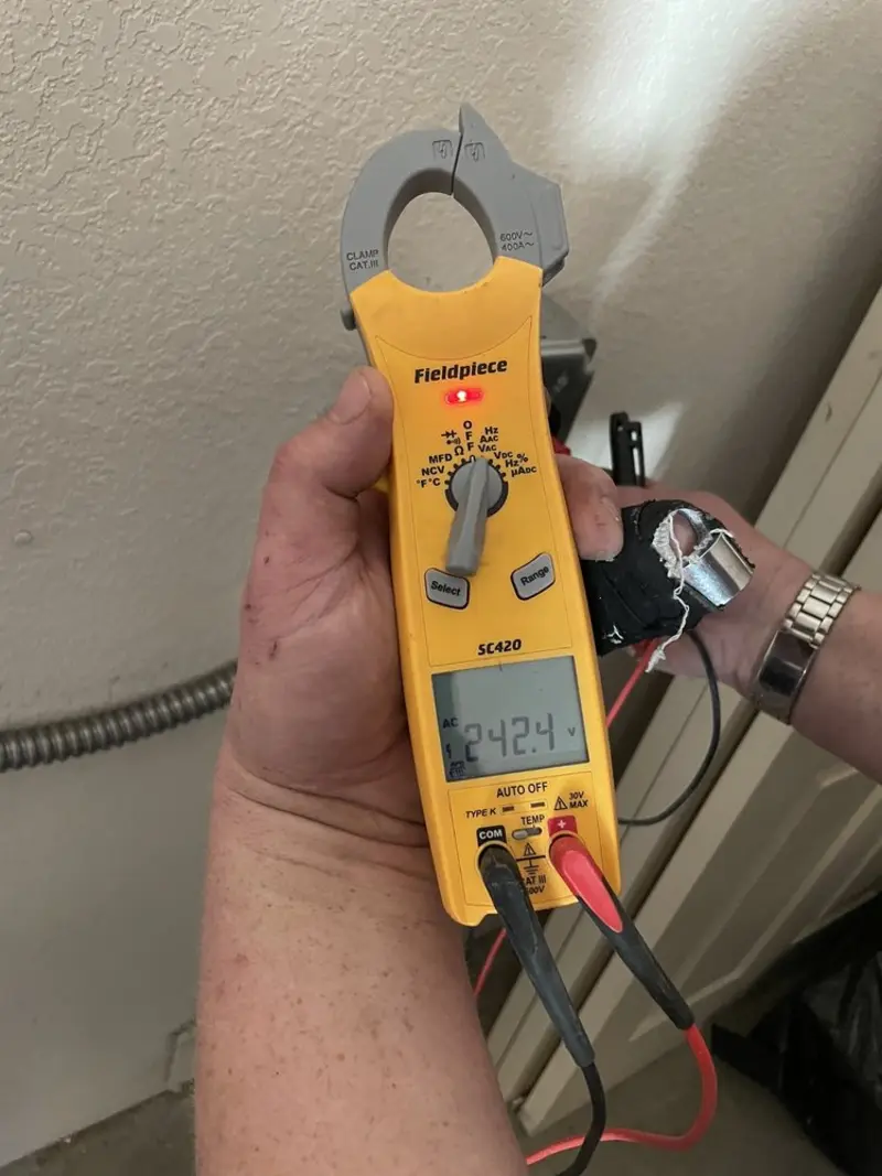 Voltage testing with clamp meter during Generator Installation in Bermuda Dunes